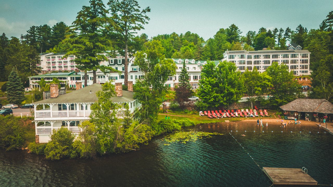Aerial of the Mirror Lake Inn and its lakefront beach