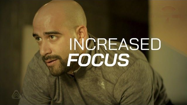 Athlete in a Tulua Nutrition pre-workout promo